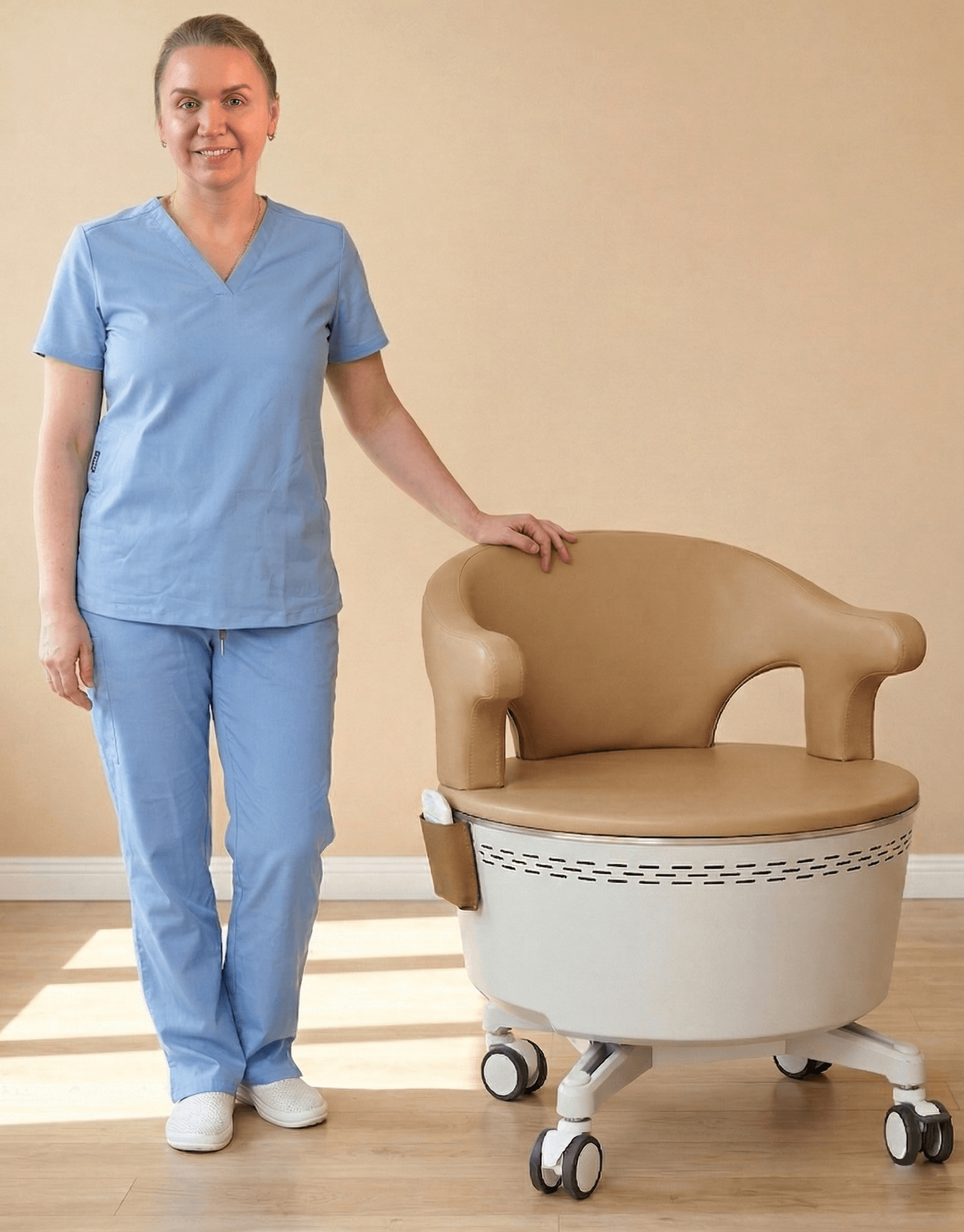 Maria beauty therapist standing beside a HIEMT pelvic chair in a beauty salon in Kirkham